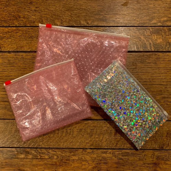 Glossier Handbags - ✨ Glossier bubble wrap cosmetic bags